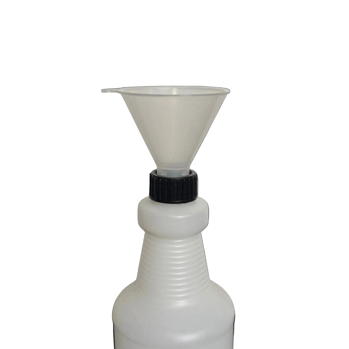 A translucent white plastic spray bottle with a black ribbed cap, fitted with a clear plastic funnel, set against a plain white wall and dark surface.