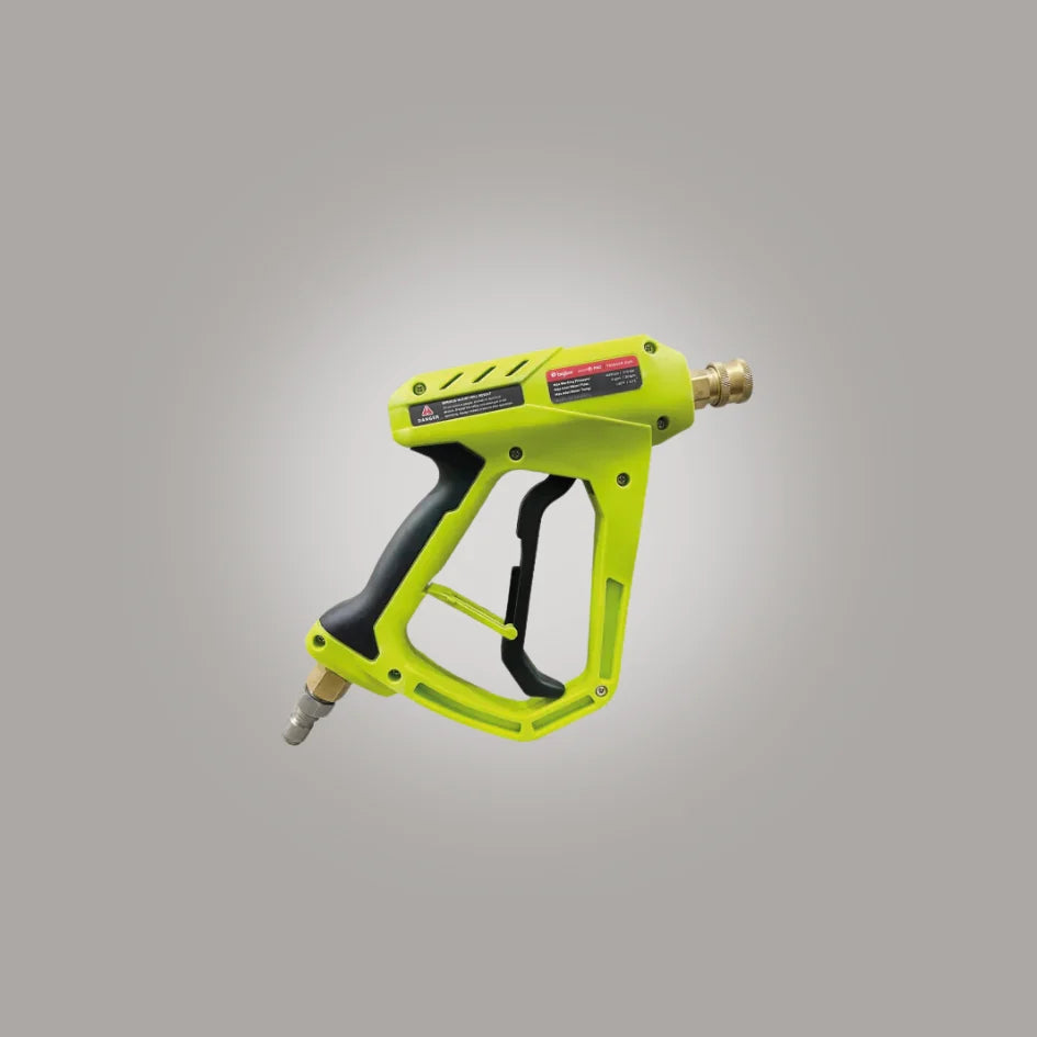 Green spray gun on a gray background
